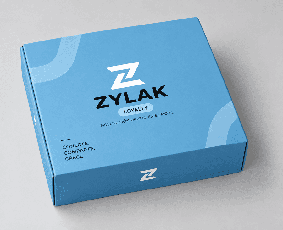 Caja de bienvenida de ZYLAK Loyalty abierta, con el expositor, la pegatina y el manual dentro